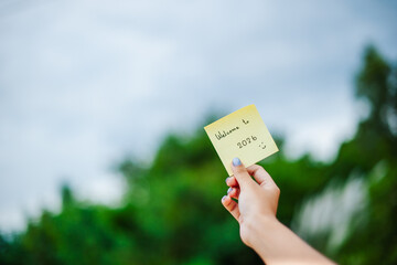 New year celebration welcome note outdoor setting personal message nature background joyful vibes