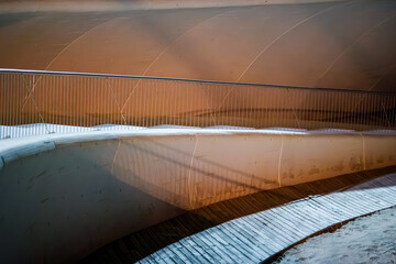 Architectural Flow: Warm Glow and Cool Shadows on the Promenade