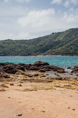 Rocky Shore and Hills at Yanui Beach, Phuket, Thailand