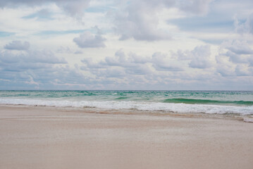Tranquil Shoreline with Gentle Waves at Karon Beach, Phuket, Thailand