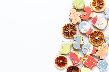 Set of different Christmas and New Year gingerbread cookies on white background, top view