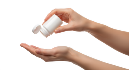 Woman's hand pouring white pills from blank medicine bottle into palm, isolated on white.