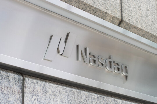 New York, NY, USA - July 8, 2022: Nasdaq logo is seen outside of its corporate headquarters located at 151 West 42nd Street in Midtown Manhattan, New York City.