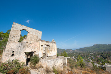 Fethiye Kayaköy stone houses and ruins. Mugla, Turkey. Kayakoy ghost village. Turkey's abandoned...