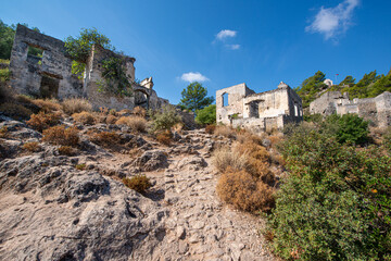 Fethiye Kayaköy stone houses and ruins. Mugla, Turkey. Kayakoy ghost village. Turkey's abandoned...
