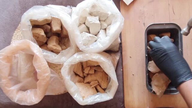 Brown clay stones on a wooden board