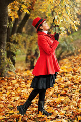 Stylish woman in a red coat