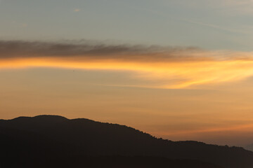 nature background of warm pastel sky at dusk or dawn