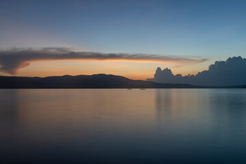 dramatic background of sunrays and colorful evening sky