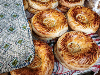 freshly baked Uzbek flatbreads in a tandoor