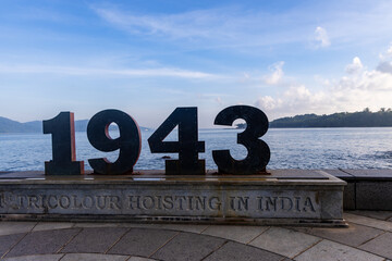 historical year 1943 monument on port blair coastline sea background