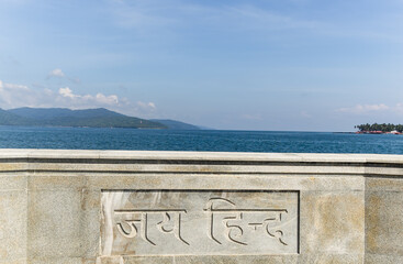 jai hind inscription on a granite wall by the sea