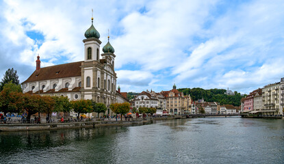 Fototapeta premium River Reuss with Jesuit Church and promenade in Lucerne, Switzerland
