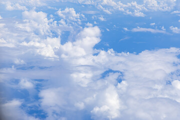 layers of cloud view form flight window during daylight flight