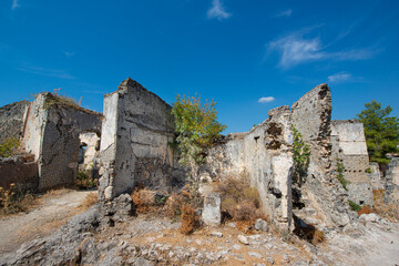 Fethiye Kayak&ouml;y stone houses and ruins. Mugla, Turkey. Kayakoy ghost village. Turkey's abandoned houses. The Ghost Town of Kayakoy. Abandoned religious ghost city.