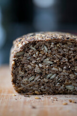 Gluten-free homemade bread with mixed grains and seeds, healthy breakfast concept