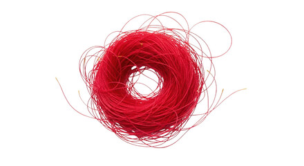 A tangled ball of bright red thread with loose strands extending outwards isolate yarn string craft textile material spool coil mess fiber hobby handmade