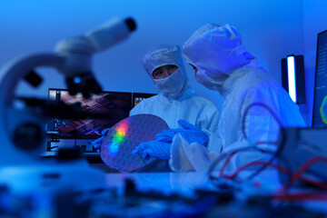 Technician working on analyzing semiconductor or microchip boards, electronics industry, electronic engineer, computer technology, CPU maintenance, hardware, motherboard component upgrades.