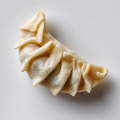 Delectable moon-shaped dumpling, a culinary symphony for Lunar New Year and World Dumpling Day, whispers savory secrets beneath its folds