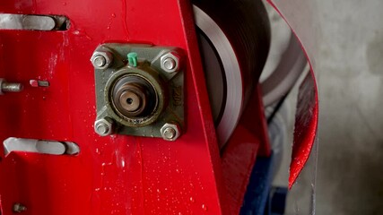 Closeup footage of coffee bean peeling machine working