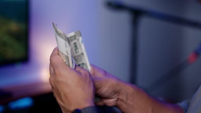 Close-Up of Indian Currency &mdash; Counting Rupee Notes for Salary or Business Payment