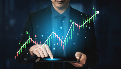 A stock market trading candlestick chart showing a bull market trend. A concept of financial...