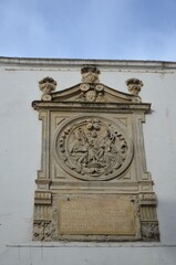 Detail of inscription in the Arenal Gate, Seville (Spain)