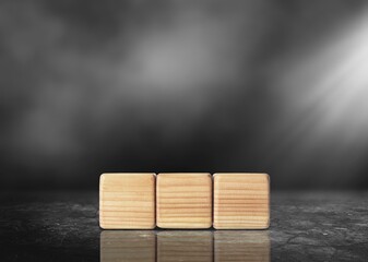 wooden blocks with Q and A letters on desk