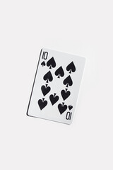 Single Ten of Spades Playing Card on White Background