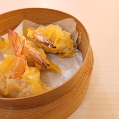dim sum dumpling on bamboo wooden basket bowl