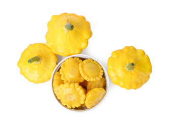 Pickled pattypan squashes in bowl and fresh vegetables isolated on white, top view