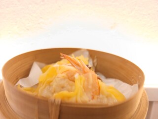 dim sum dumpling on bamboo wooden basket bowl