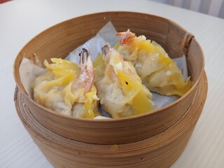 dim sum dumpling on bamboo wooden basket bowl