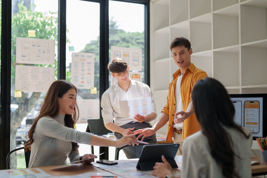 Ui designers collaborating on mobile application development