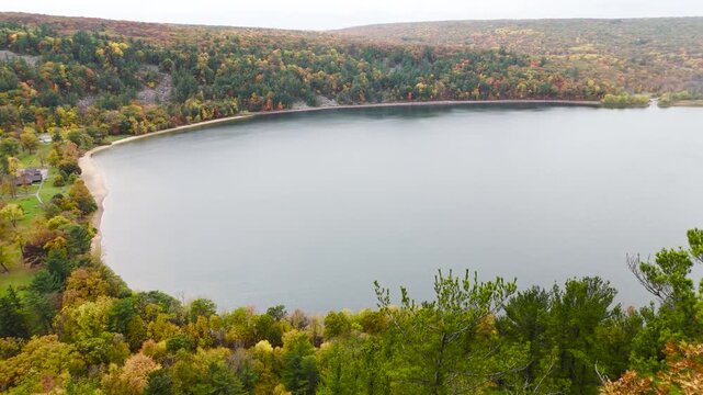 Aerial Reveal Shot Off The Cliffs Of Devil's Lake State Park In The Fall Time