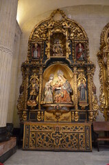 Seville, Spain 03.25.2019: Saint Anne teaching Virgin Mary to read, sculptures from 1714 by Jose...