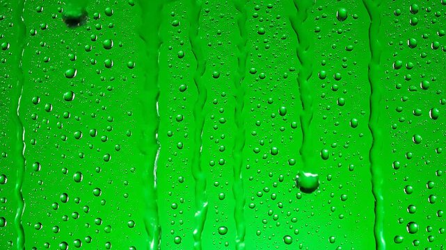 Refreshing Green Background with Water Droplets. Clean, Fresh Texture for Beverage, Skincare, and Eco-Friendly Product Design.