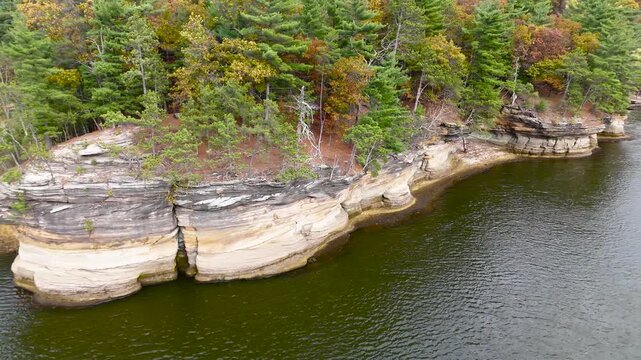 Aerial View Of Wisconsin River Coast With Fall Foliage & Rock Bluff Cliffs