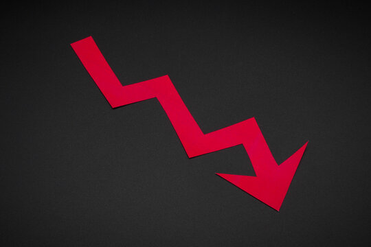 Red arrow symbolizing a decline in value.
