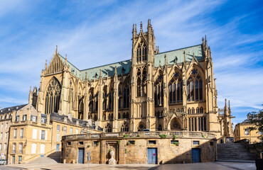 Metz, France - September 6, 2025: Northern facade of Saint Stephen cathedral of gothic style, achieved in 1552 and listed historical monument since 1930, seen from the Chambre square.