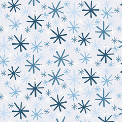 Hand-drawn snowflake pattern. Seamless winter background. Abstract doodle-style illustration for Christmas or New Year's holiday designs.