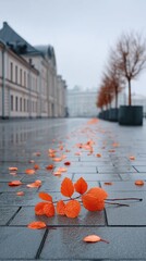 Autumn scene of scattered orange petals on wet cobblestone pavement outside classical architecture building with bare trees in background overcast day