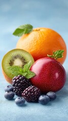 Assorted Fresh Fruits Including Orange Kiwi Blackberries And Blueberries Garnished With Mint Leaves On A Blue Textured Background With Soft Lighting