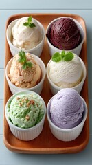 Assorted Ice Cream Flavors In White Ramekins Arranged On A Wooden Tray With Mint Garnish