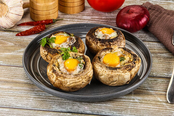 Baked champignon with quail egg