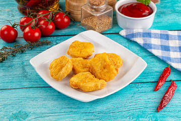 Golden crispy fried chicken nuggets