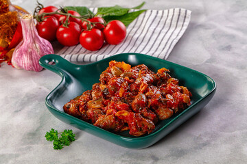 Roasted chicken hearts with vegetables