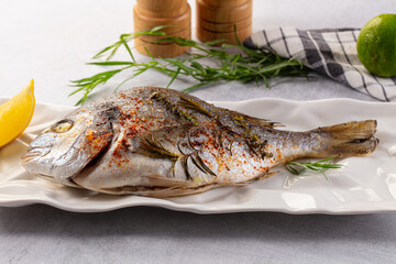Baked dorada fish with spices