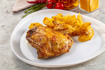 Baked chicken thighs with potatoes