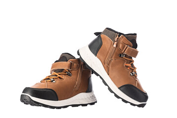 Kids Shoes Brown Hiking Boots With Black Toe Cap And White Sole For Outdoor Adventure Durable Trail Footwear for Autumn and Winter season isolated on white background
